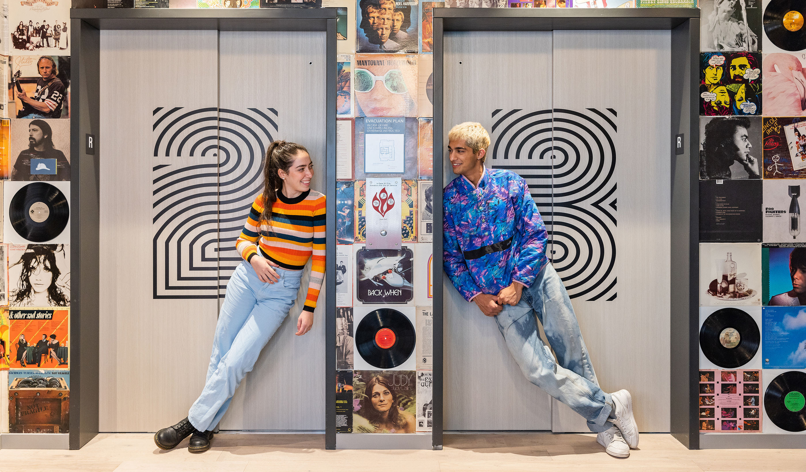 Friends in front of elevators