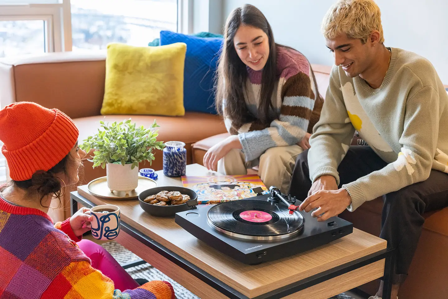 residents playing music and sharing snacks at ōLiv Seattle